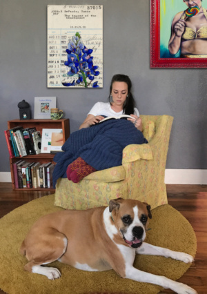 Heidi Pitre illustrates the texas bluebonnet on an oversized canvas print on a vintage library card