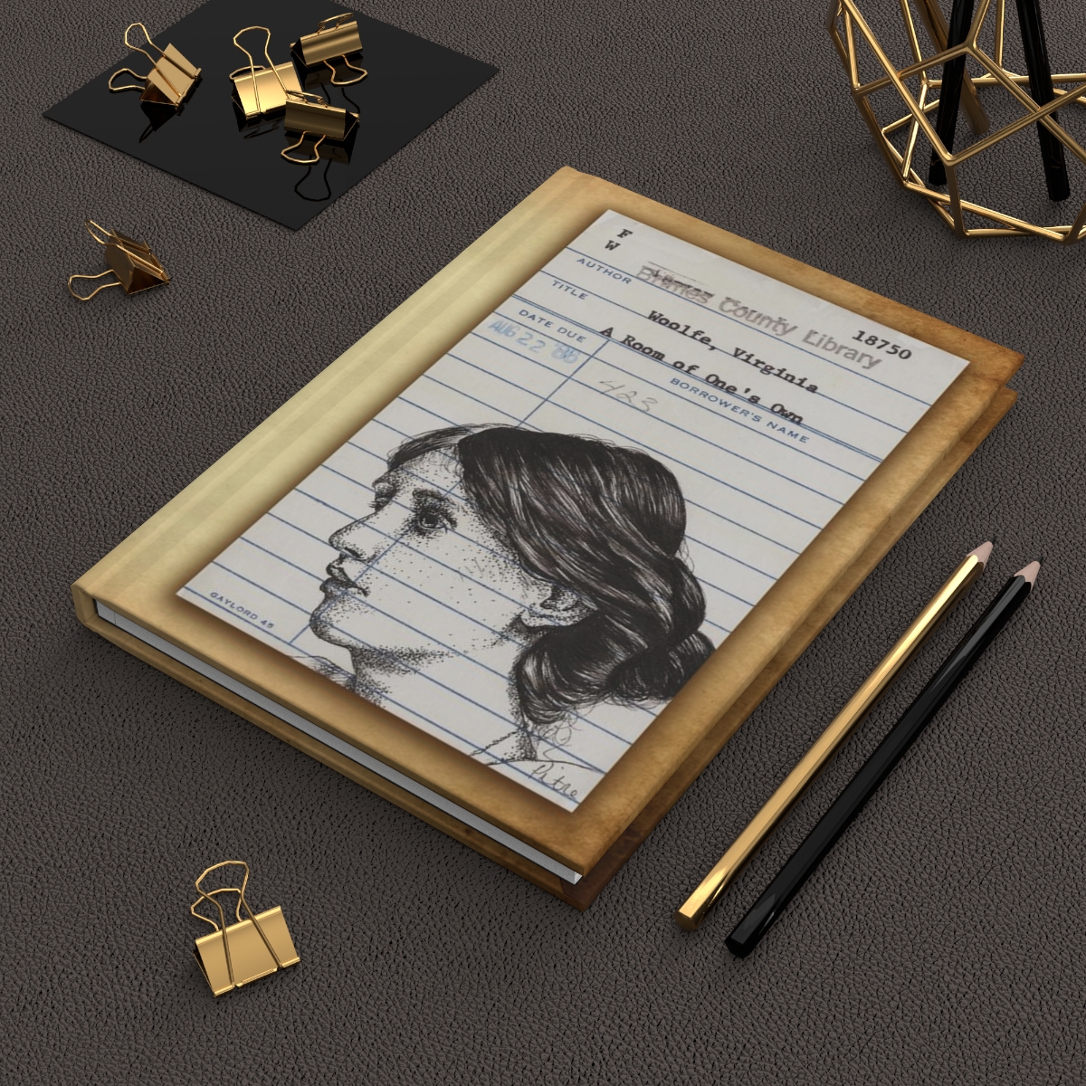 Heid Pitre writing journal with an old library borrowers card on the cover of Virginia Woolf A room of one's own for book lovers and librarians.