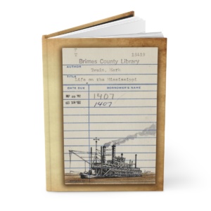 Heid Pitre writing journal with an old library borrowers card on the cover of Fear and loathing in Las Vegas for book lovers and librarians.