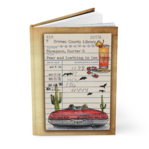 Heid Pitre writing journal with an old library borrowers card on the cover of Fear and loathing in Las Vegas for book lovers and librarians.