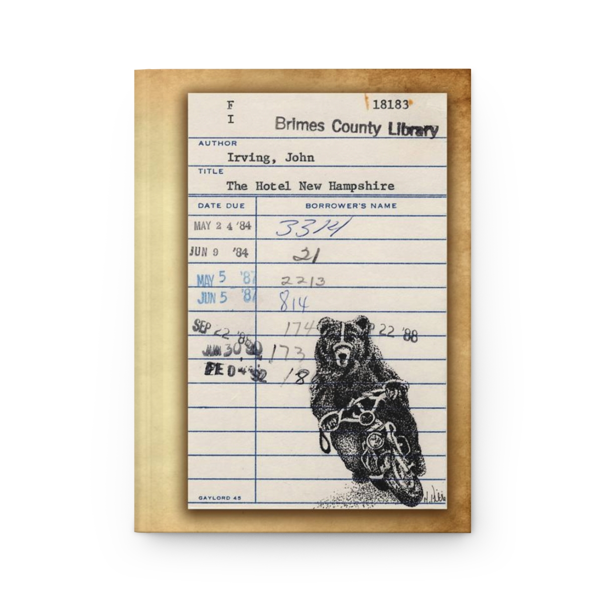 Heid Pitre writing journal with an old library borrowers card on the cover of Hotel New Hampshire for book lovers and librarians.