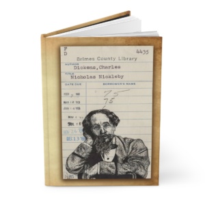 Heid Pitre writing journal with an old library borrowers card on the cover of Charles Dickens for book lovers and librarians.