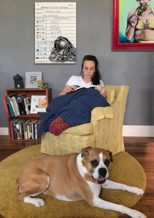 Heidi Pitre pen and ink drawing of a train on an oversized canvas print of a vintage library borrower card for Anna karinina.