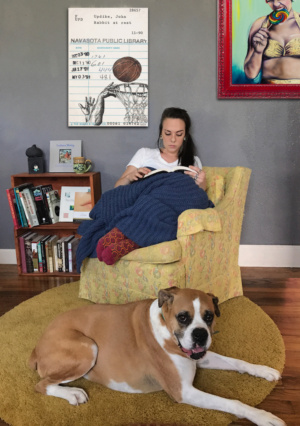 Heidi Pitre pen and ink and watercolor drawing of a basketball hoop and ball on an oversized canvas print of a vintage library borrower card for rabbit at rest.