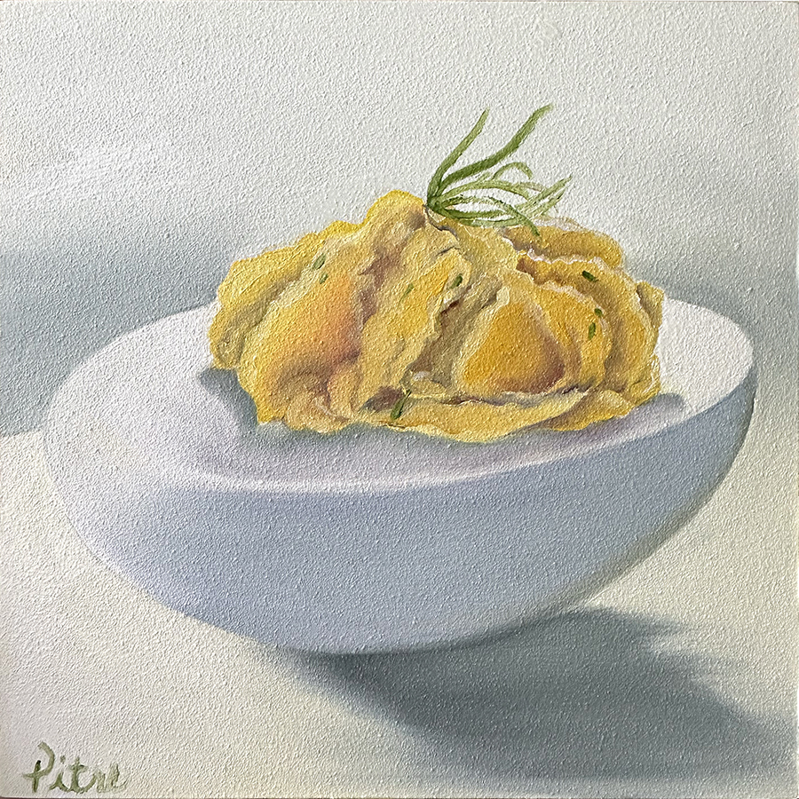 Heidi Pitre oil painting on panel of a deviled egg on a white background.